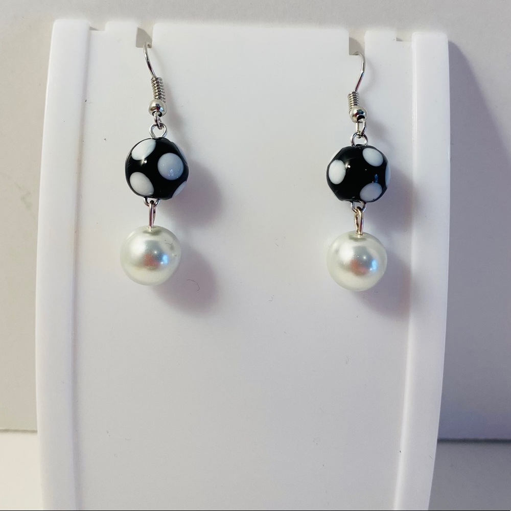 Conta di odjo earrings with pearl